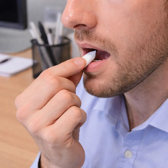 Office worker using a nicotine pouch