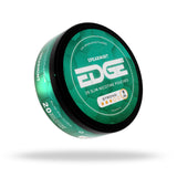 Green container of Spearmint Edge nicotine pouches on a white background